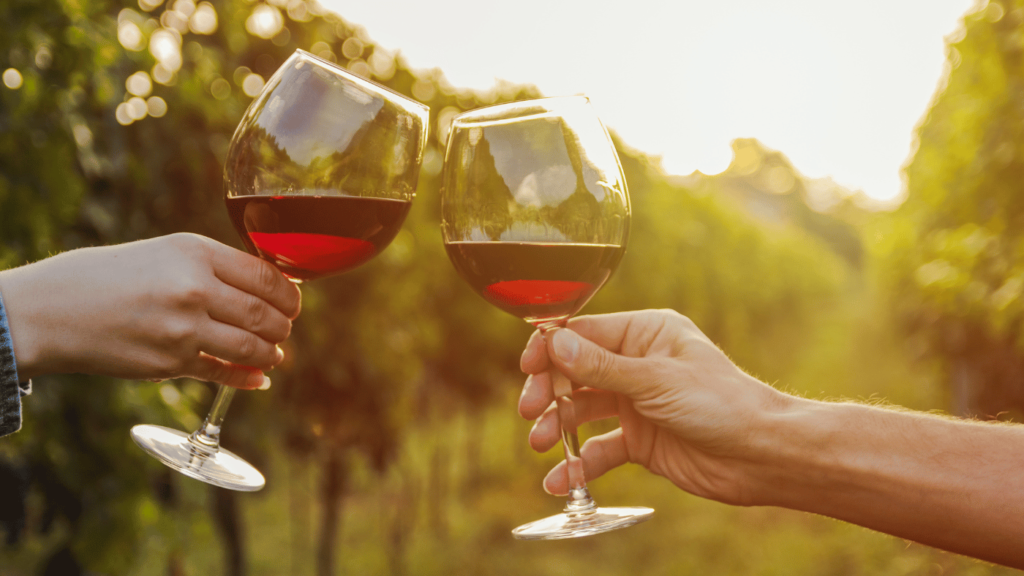 Exterior of a winery with patrons enjoying wine